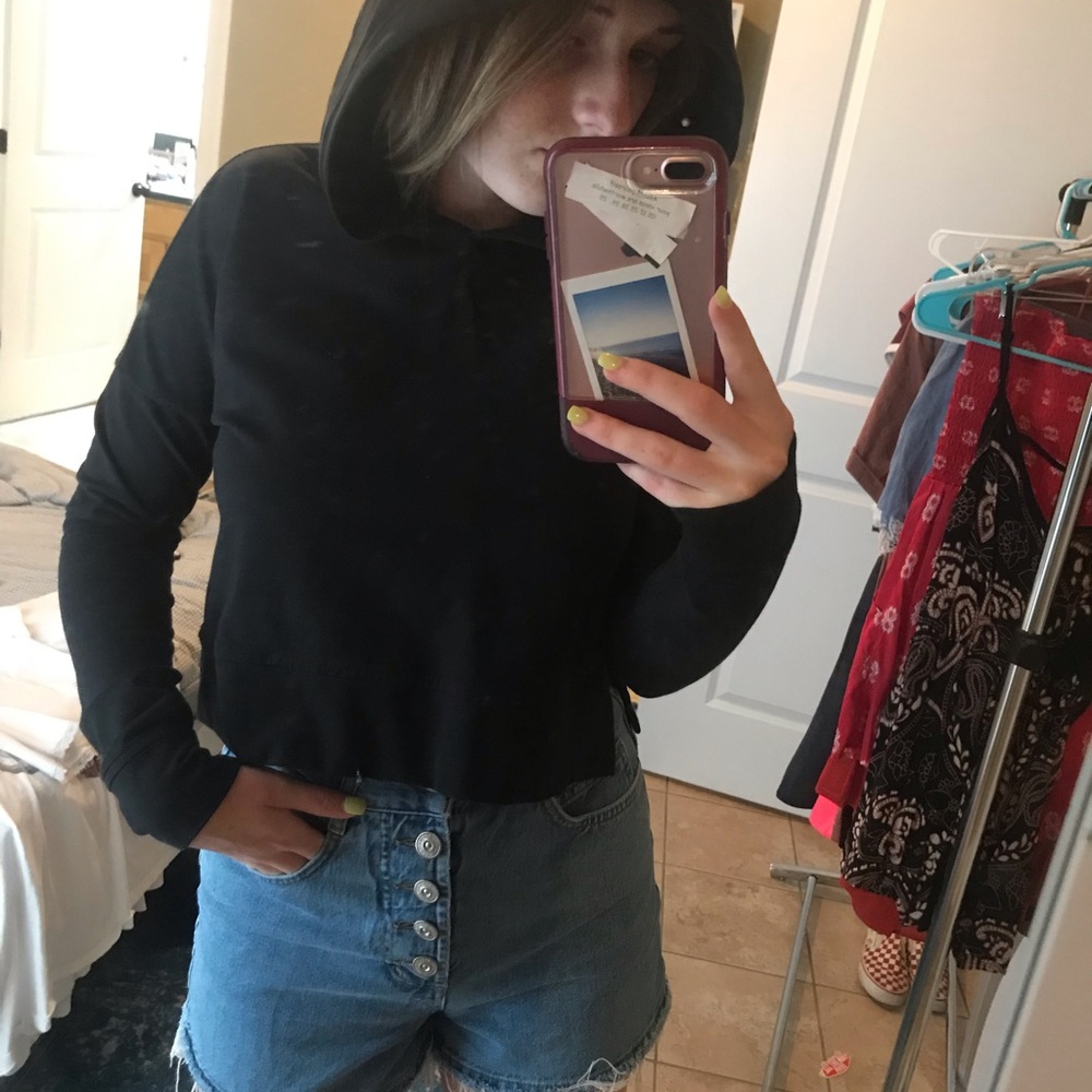 Black cropped hoodie.